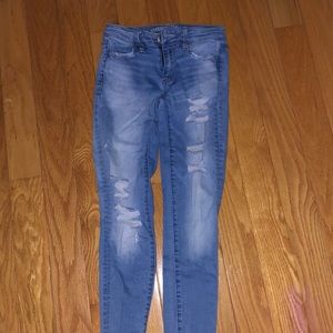 light blue super stretch ripped jeans from American eagle